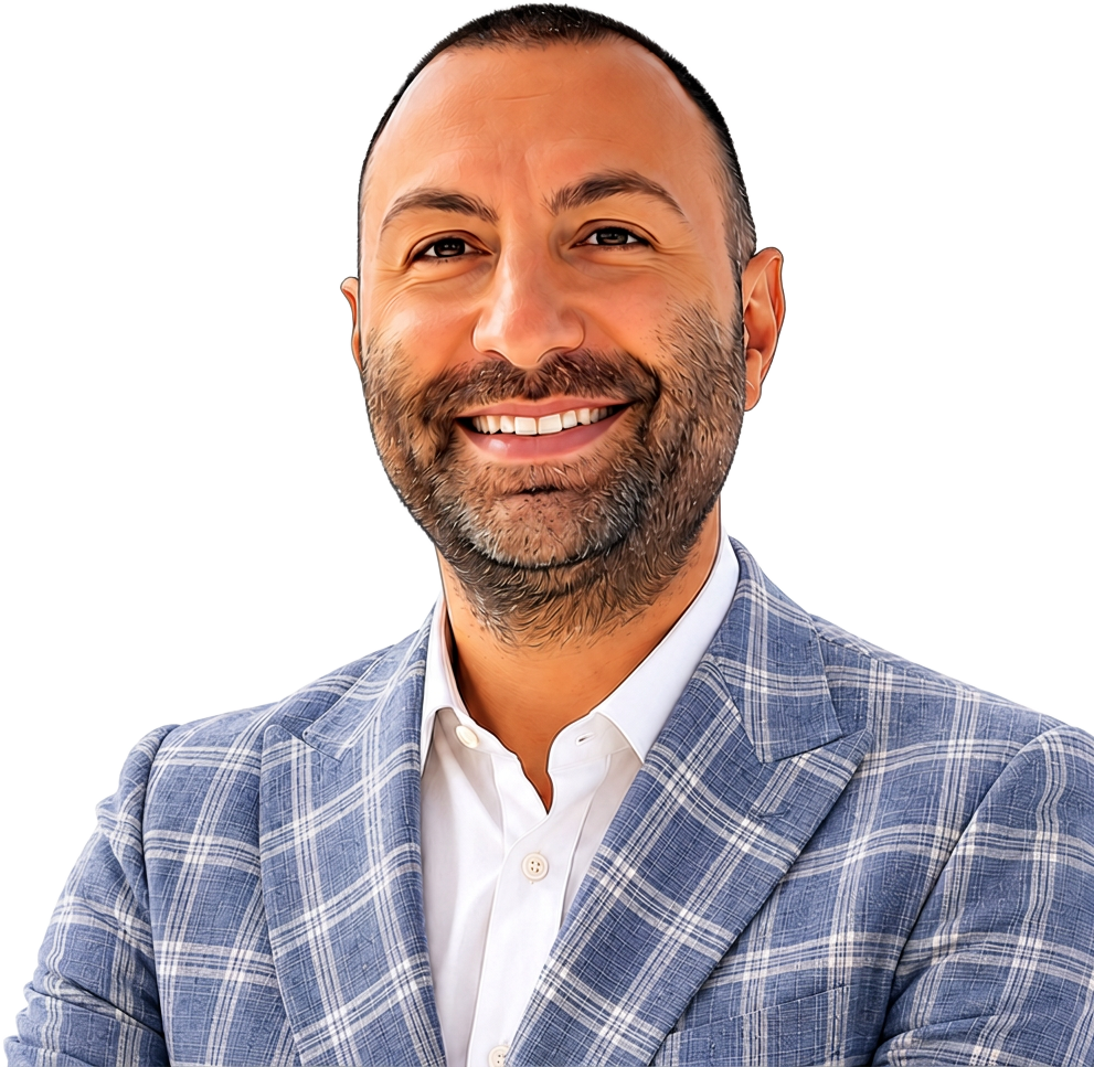 The founder smiling in a blue plaid jacket